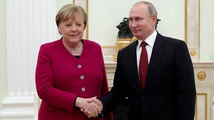 Angela Merkel si Vladimir Putin - Foto Reuters